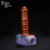 A Fantasy Grove sex toy on a black background with a logo in the upper left corner