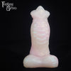 A fantasy sex toy on a black background with the Fantasy Grove logo in the upper left corner