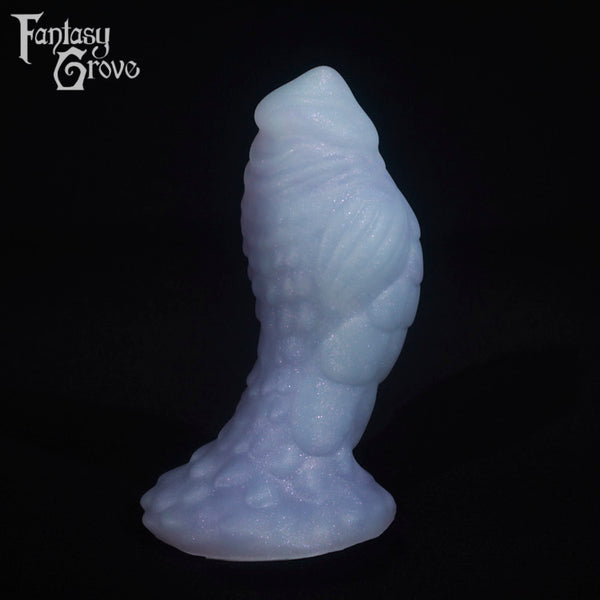 A fantasy sex toy on a black background with the Fantasy Grove logo in the upper left corner