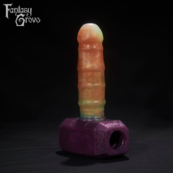 A Fantasy Grove sex toy on a black background with a logo in the upper left corner