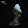A fantasy sex toy on a black background with the Fantasy Grove logo in the upper left corner