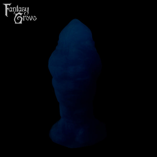 A fantasy sex toy on a black background with the Fantasy Grove logo in the upper left corner