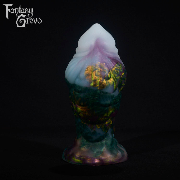 A fantasy sex toy on a black background with the Fantasy Grove logo in the upper left corner