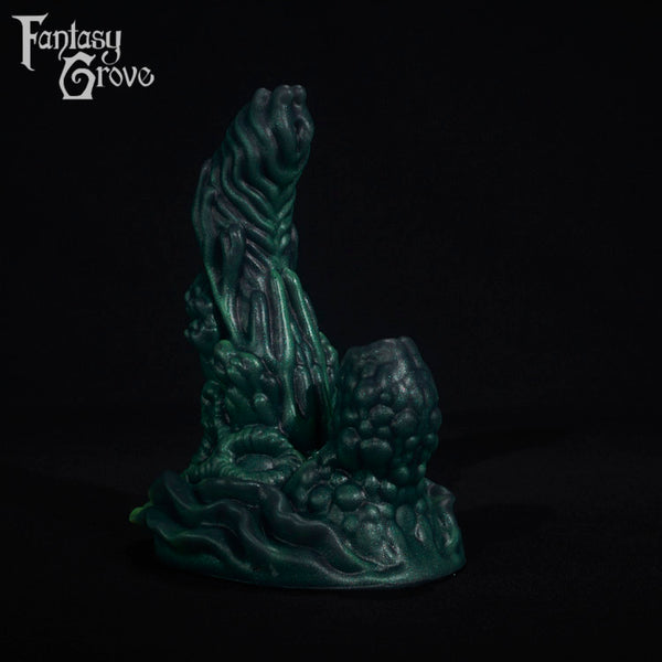 A fantasy sex toy on a black background with the Fantasy Grove logo in the upper left corner