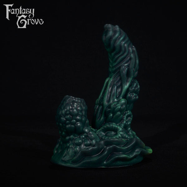 A fantasy sex toy on a black background with the Fantasy Grove logo in the upper left corner