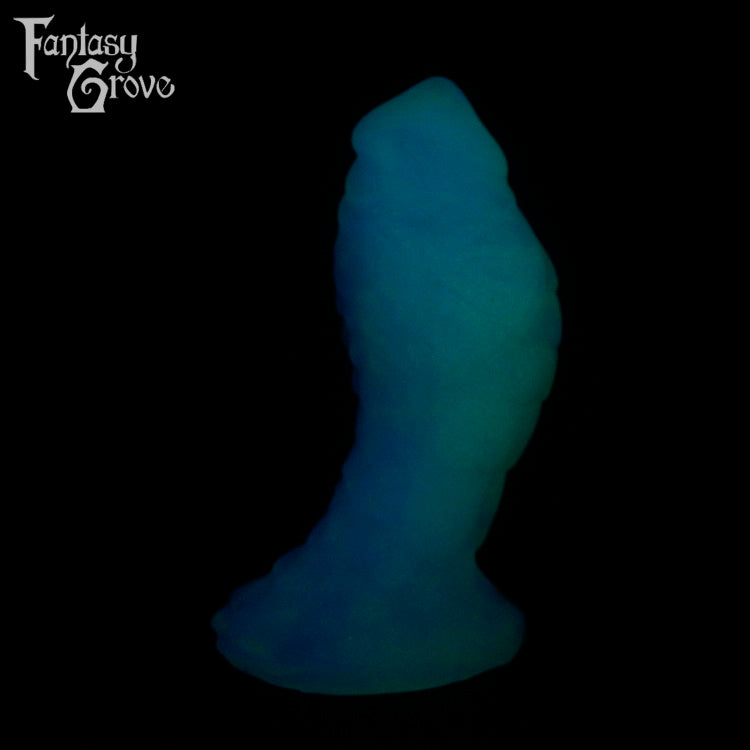 A fantasy sex toy on a black background with the Fantasy Grove logo in the upper left corner