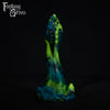 A fantasy sex toy on a black background with the Fantasy Grove logo in the upper left corner
