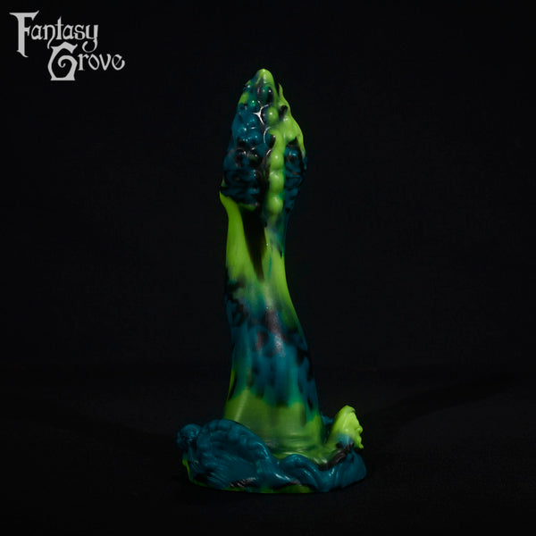 A fantasy sex toy on a black background with the Fantasy Grove logo in the upper left corner