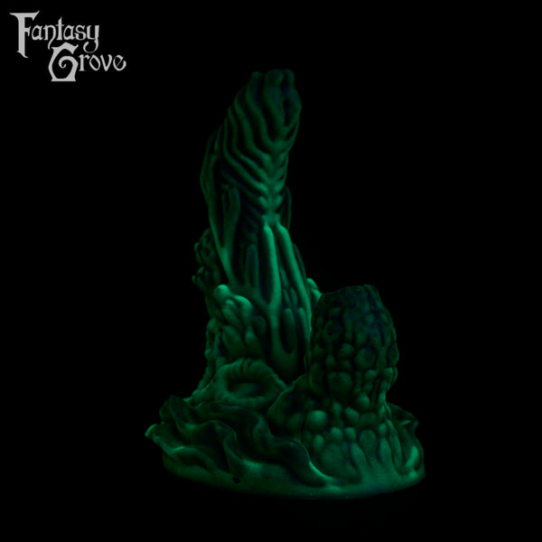 A fantasy sex toy on a black background with the Fantasy Grove logo in the upper left corner