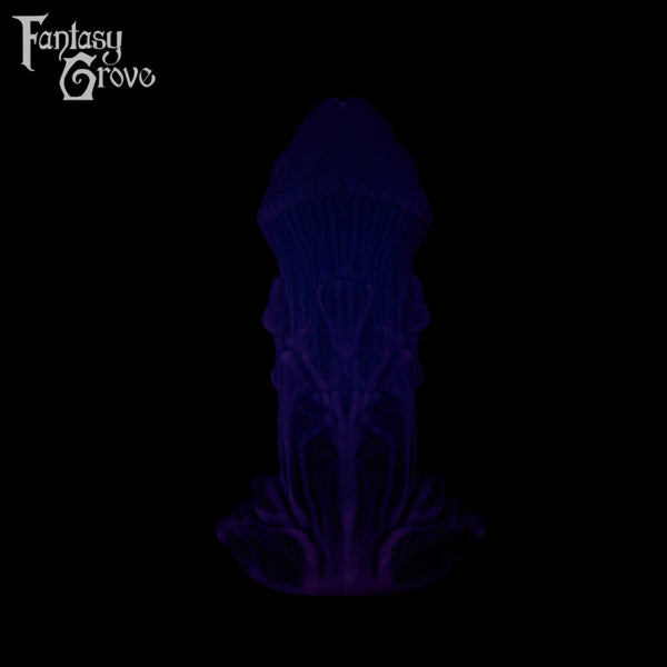 A Fantasy Grove sex toy on a black background with a logo in the upper left corner