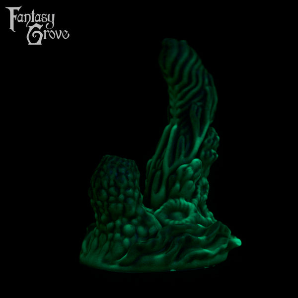 A fantasy sex toy on a black background with the Fantasy Grove logo in the upper left corner