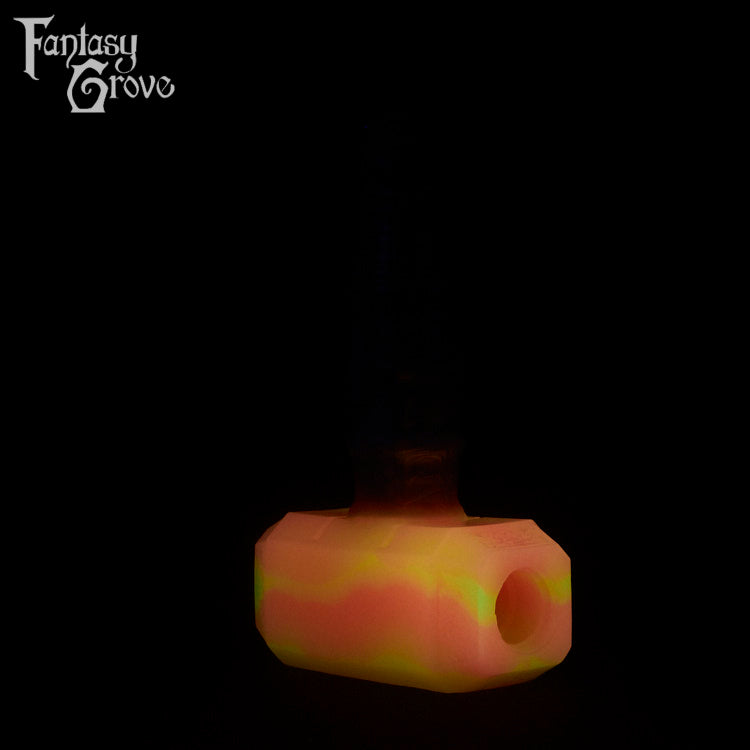 A Fantasy Grove sex toy on a black background with a logo in the upper left corner