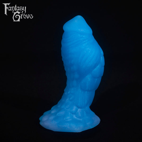 A fantasy sex toy on a black background with the Fantasy Grove logo in the upper left corner