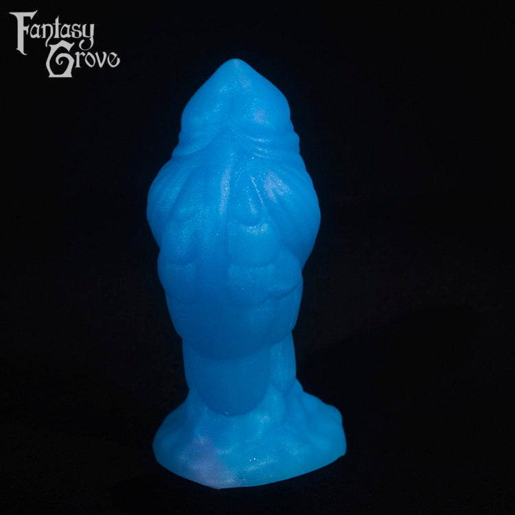 A fantasy sex toy on a black background with the Fantasy Grove logo in the upper left corner