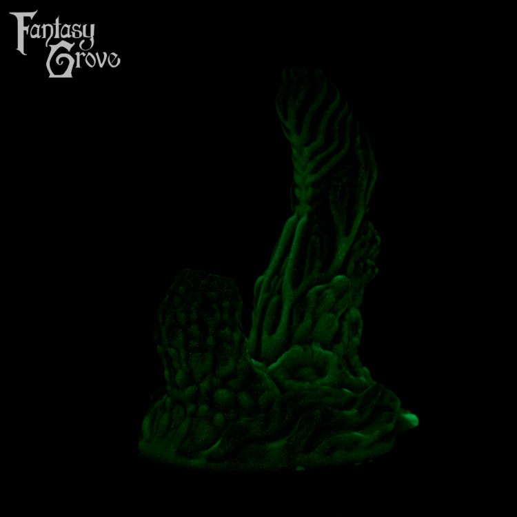 A fantasy sex toy on a black background with the Fantasy Grove logo in the upper left corner