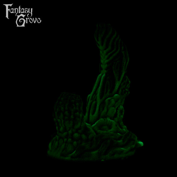 A fantasy sex toy on a black background with the Fantasy Grove logo in the upper left corner