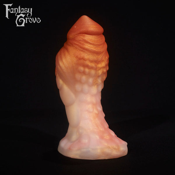A fantasy sex toy on a black background with the Fantasy Grove logo in the upper left corner