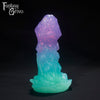 A Fantasy Grove sex toy on a black background with a logo in the upper left corner