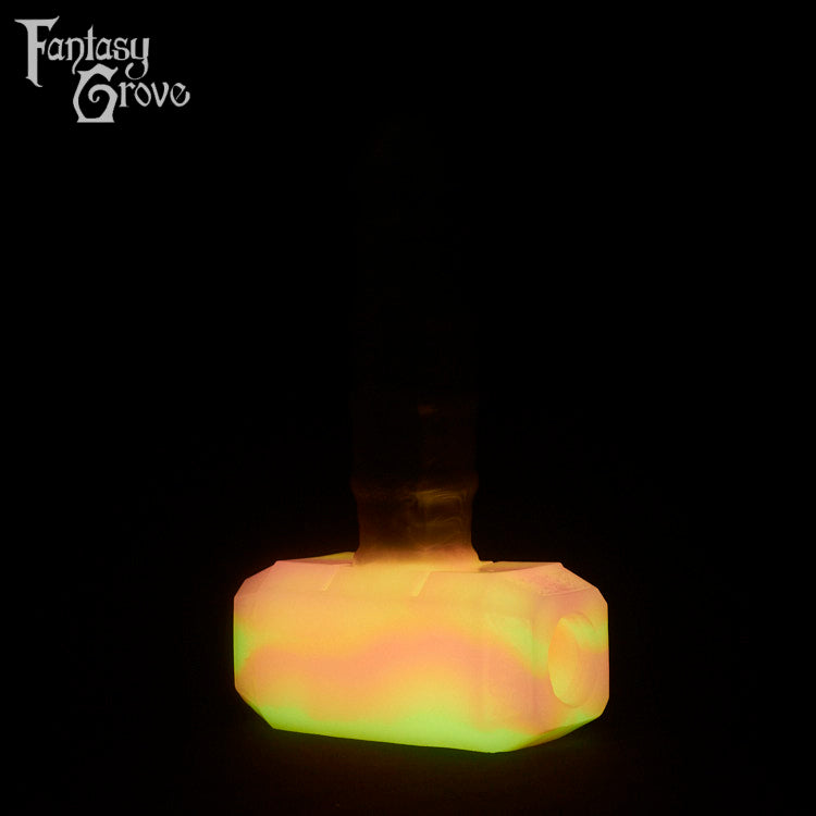 A Fantasy Grove sex toy on a black background with a logo in the upper left corner