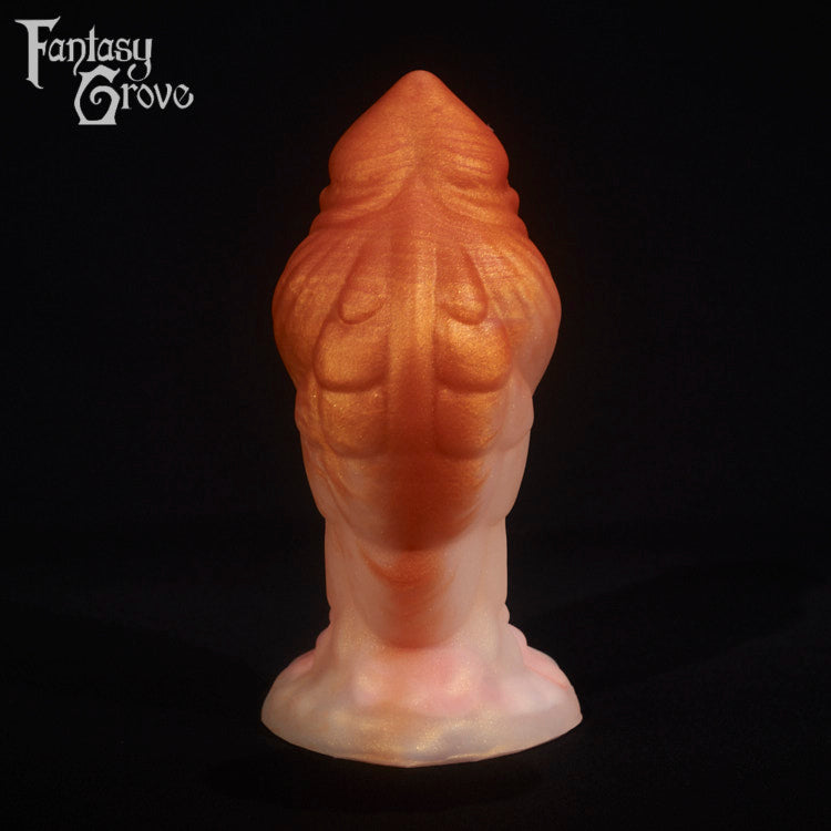 A fantasy sex toy on a black background with the Fantasy Grove logo in the upper left corner