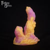 A fantasy sex toy on a black background with the Fantasy Grove logo in the upper left corner