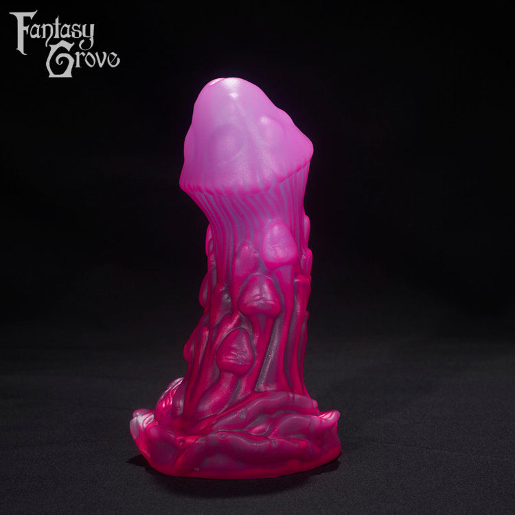 A Fantasy Grove sex toy on a black background with a logo in the upper left corner