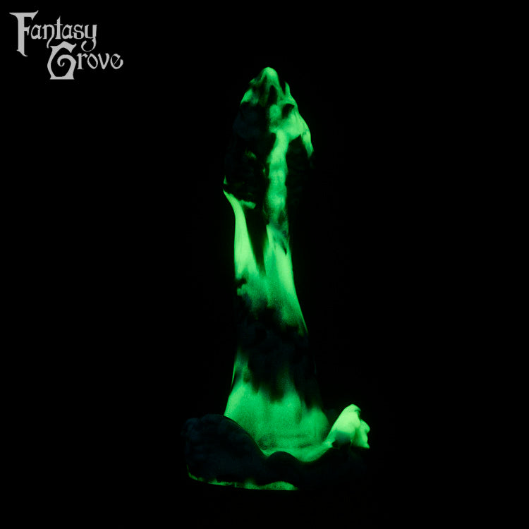 A fantasy sex toy on a black background with the Fantasy Grove logo in the upper left corner