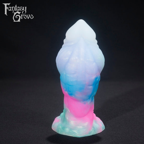 A fantasy sex toy on a black background with the Fantasy Grove logo in the upper left corner 