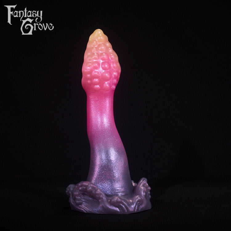 A fantasy sex toy on a black background with the Fantasy Grove logo in the upper left corner
