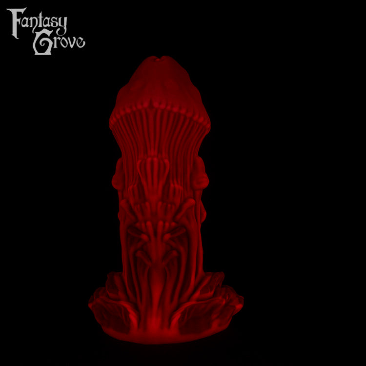 A Fantasy Grove sex toy on a black background with a logo in the upper left corner