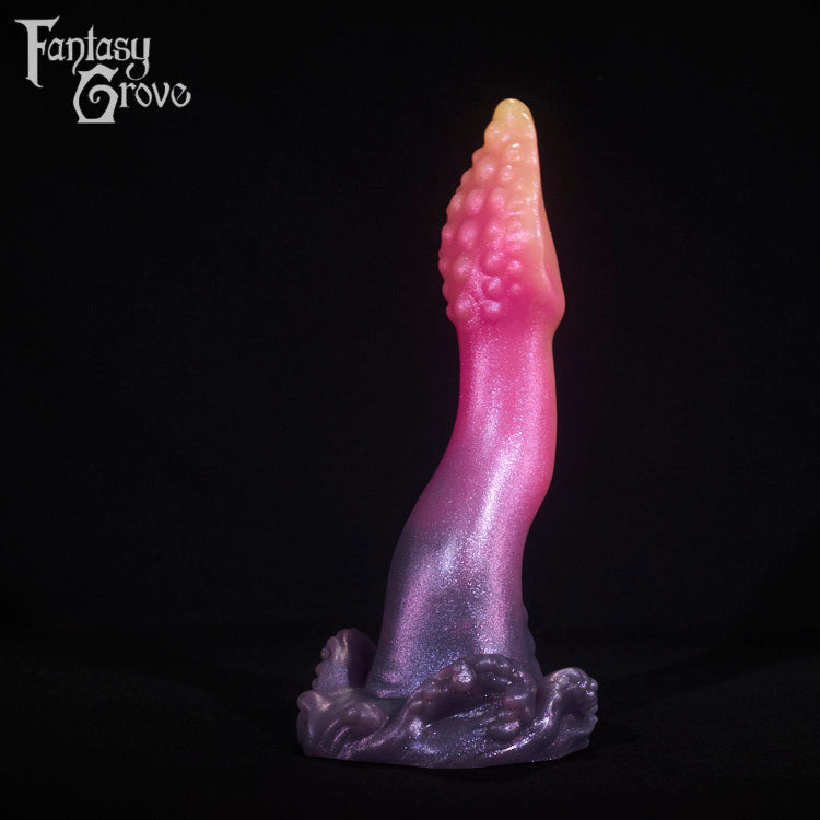 A fantasy sex toy on a black background with the Fantasy Grove logo in the upper left corner