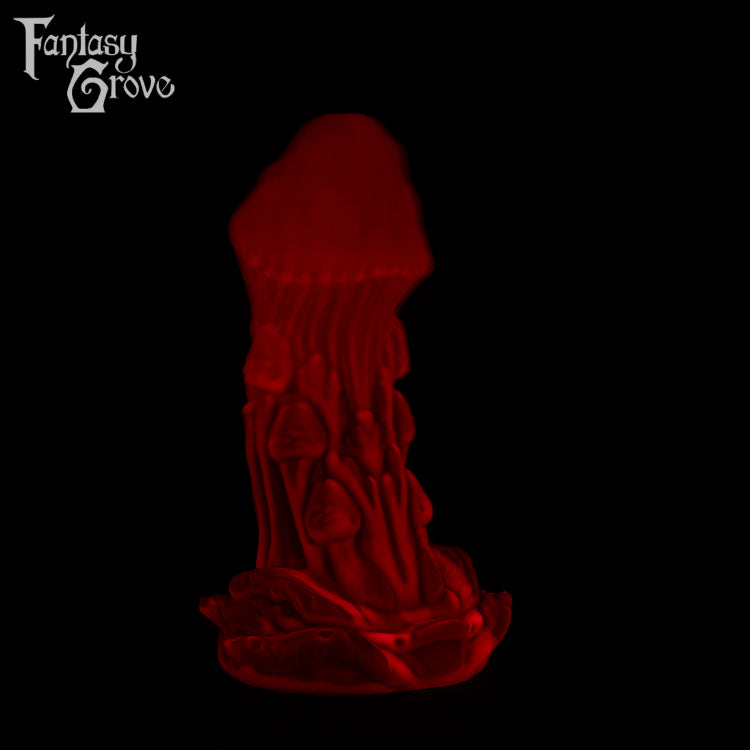 A Fantasy Grove sex toy on a black background with a logo in the upper left corner