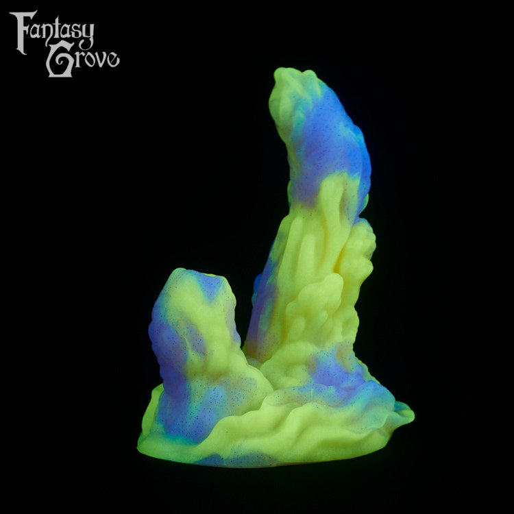 A fantasy sex toy on a black background with the Fantasy Grove logo in the upper left corner