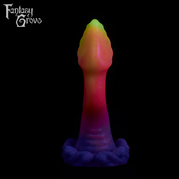 A fantasy sex toy on a black background with the Fantasy Grove logo in the upper left corner