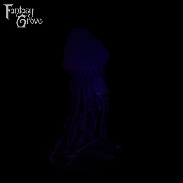 A Fantasy Grove sex toy on a black background with a logo in the upper left corner