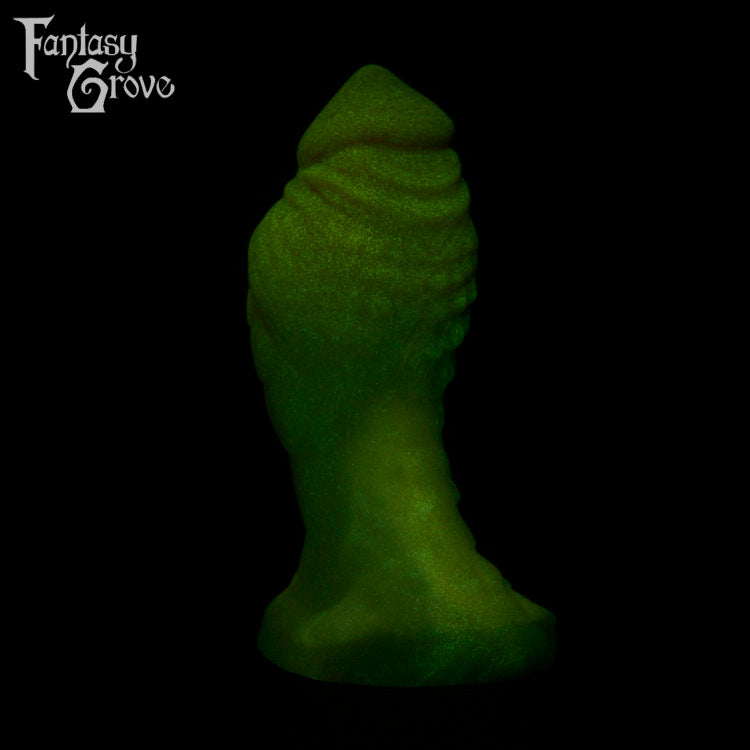 A fantasy sex toy on a black background with the Fantasy Grove logo in the upper left corner