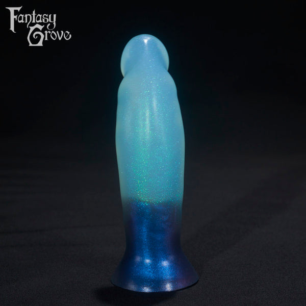 A Fantasy Grove sex toy on a black background with a logo in the upper left corner
