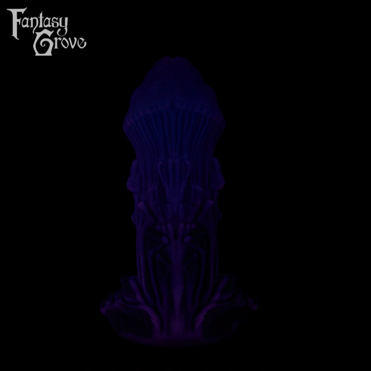 A Fantasy Grove sex toy on a black background with a logo in the upper left corner