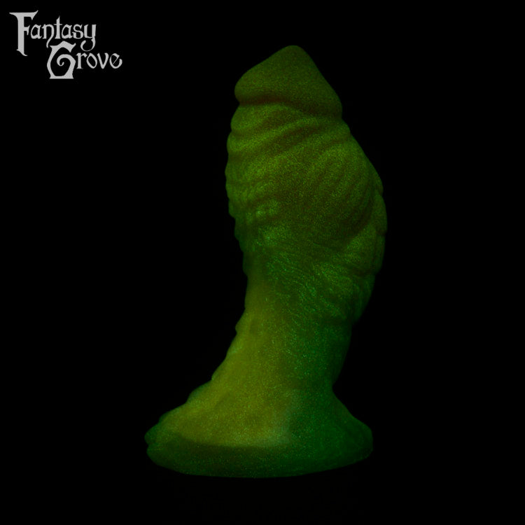 A fantasy sex toy on a black background with the Fantasy Grove logo in the upper left corner