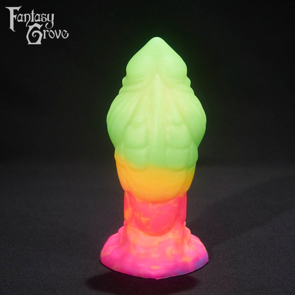 A fantasy sex toy on a black background with the Fantasy Grove logo in the upper left corner 