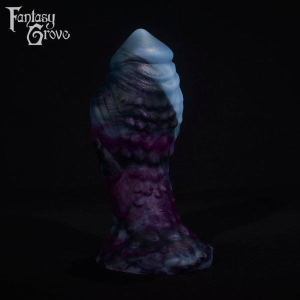 A fantasy sex toy on a black background with the Fantasy Grove logo in the upper left corner