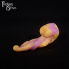 A fantasy sex toy on a black background with the Fantasy Grove logo in the upper left corner