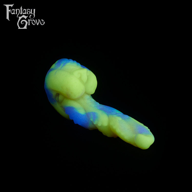 A fantasy sex toy on a black background with the Fantasy Grove logo in the upper left corner
