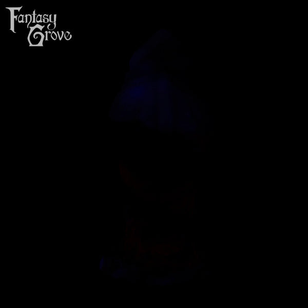 A fantasy sex toy on a black background with the Fantasy Grove logo in the upper left corner