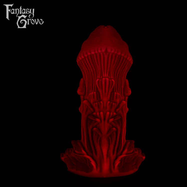 A Fantasy Grove sex toy on a black background with a logo in the upper left corner