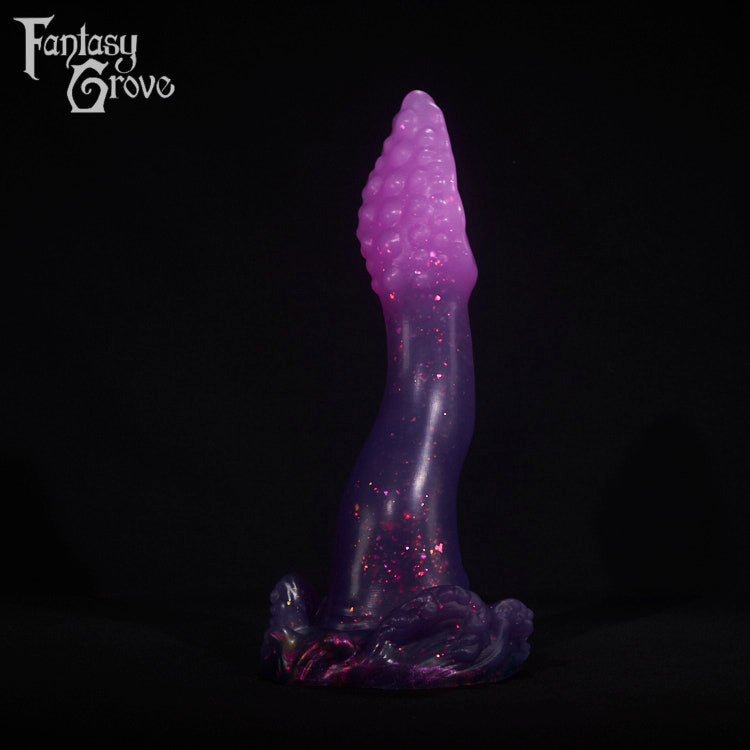 A fantasy sex toy on a black background with the Fantasy Grove logo in the upper left corner