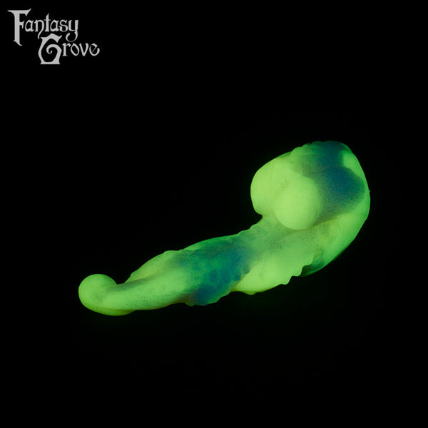 A fantasy sex toy on a black background with the Fantasy Grove logo in the upper left corner
