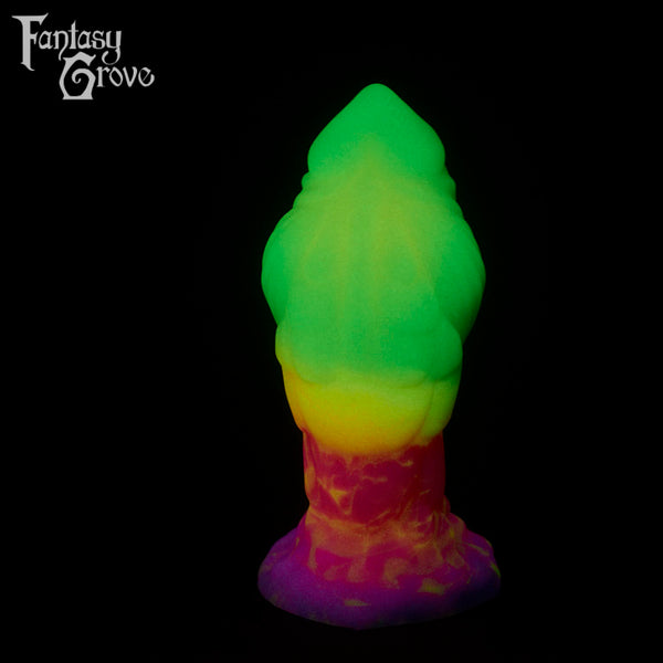 A fantasy sex toy on a black background with the Fantasy Grove logo in the upper left corner 