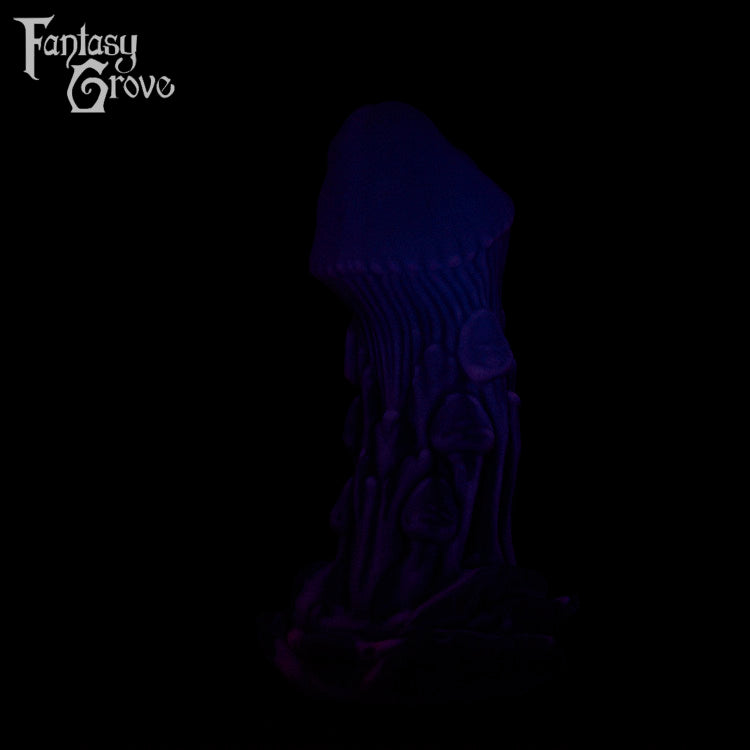 A Fantasy Grove sex toy on a black background with a logo in the upper left corner