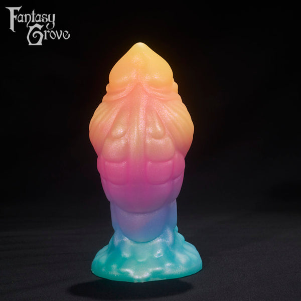 A fantasy sex toys on a black background with Fantasy Grove branding